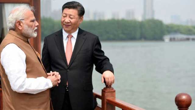 নরেন্দ্র মোদি ও শি জিনপিং। ছবি: রয়টার্স ফাইল ফটো